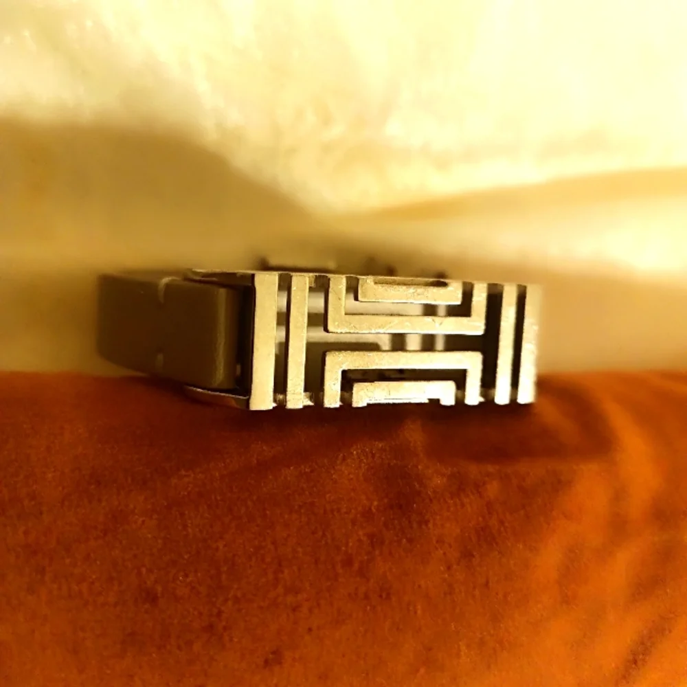 Tory Burch gray rubber Fitbit cover double strand